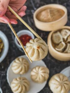 Pam Pam Buns steam buns with chopsticks