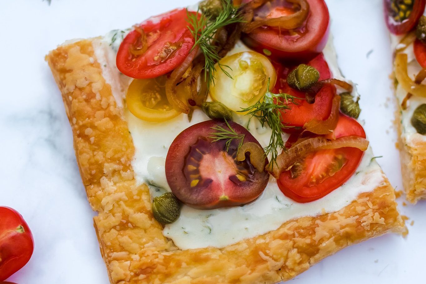 Whipped feta and cherry tomato tart | Nourish plant-based living