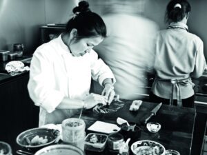 Chef preparing food at Split Apple Retreat