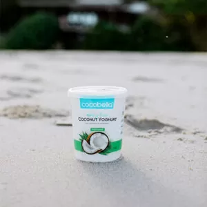 Cocobella natural coconut yoghurt on beach