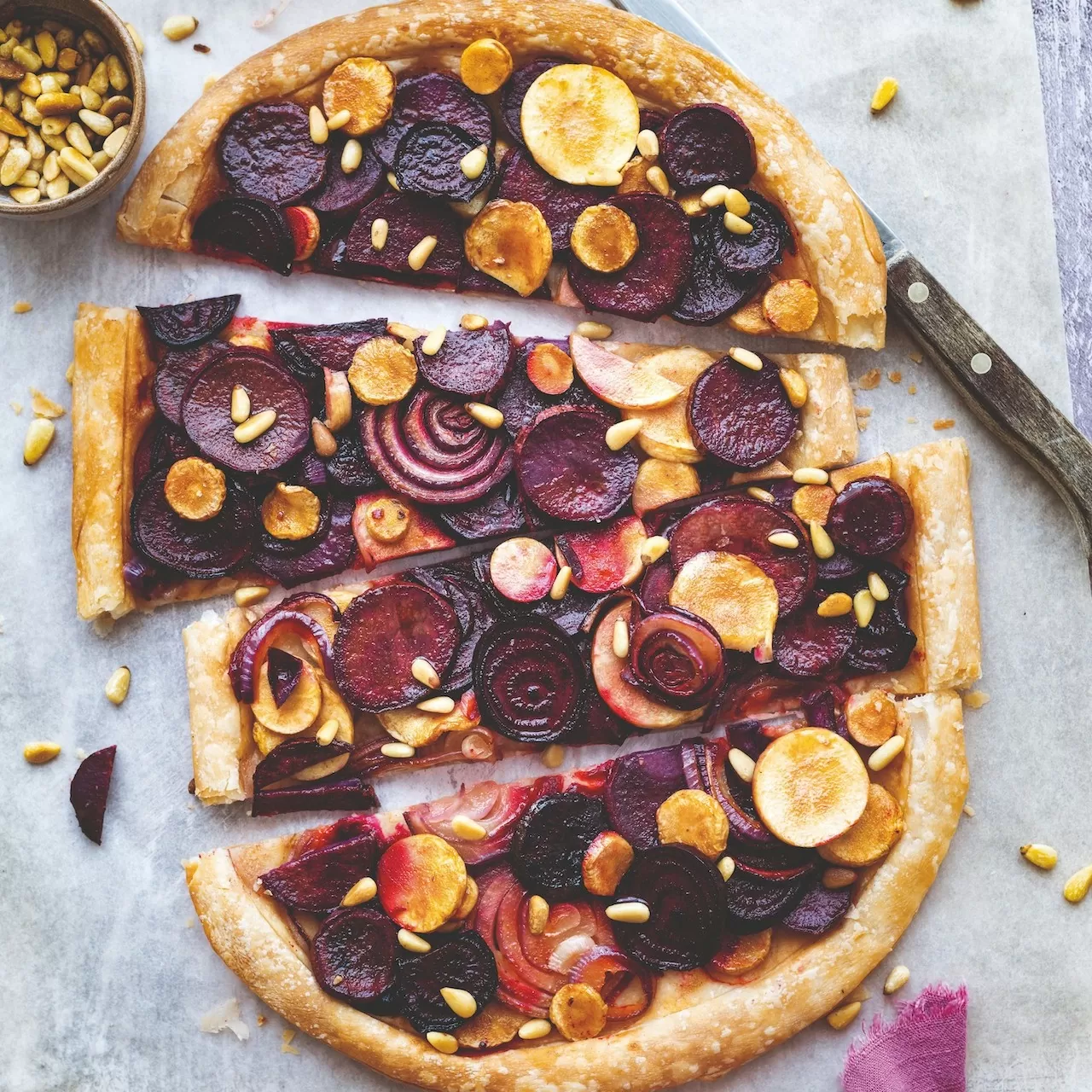 Adamantia Velonis's Parsnip and miso tart on marble bench