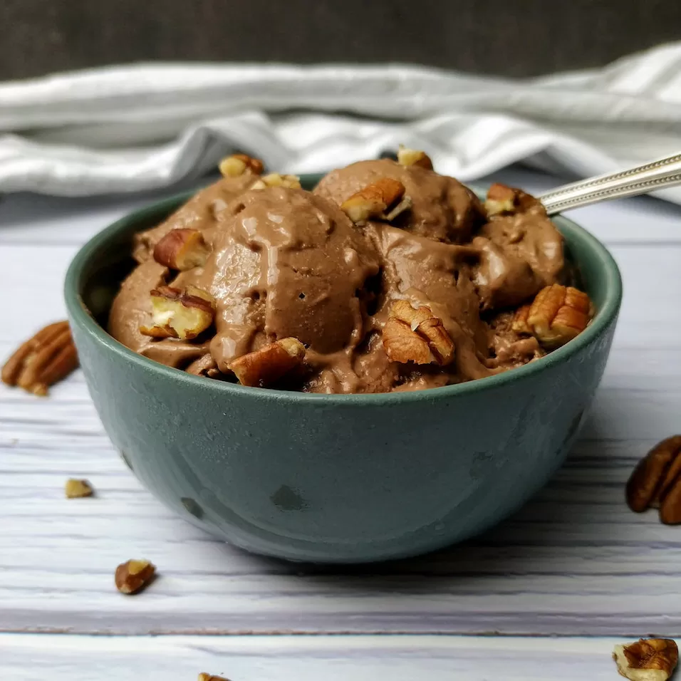 Bowl of homemade 'nice cream' on whitewashed wooden table