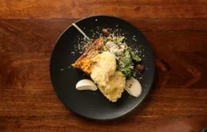 Darrys Verandah - Cauliflower sponge and baked cauliflower custard with raw cauliflower, preserved lemon and dukkah salad