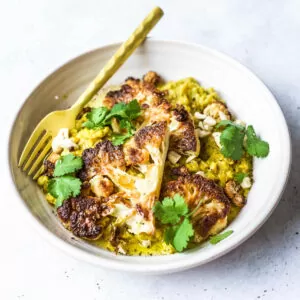 Jacqueline Alwill Split pea dhal with roast cauliflower and rice dinner bowl on wooden table benchtop