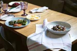 Transformer table with plates and wine glass