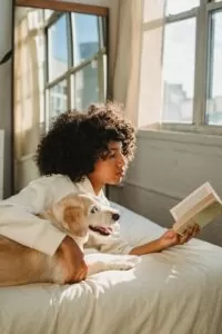 Woman with beloved rescue dog, loving each other